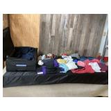 Black Suitcase With Assorted Clothing