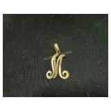 14K Gold ï¿½Mï¿½ Pendant, 2.7 Grams