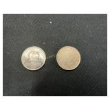 Two Asian Coins Featuring Floral and Symbolic Desi