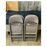 Eight Metal Folding Chairs