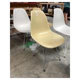 5 chrome plastic chairs (Eames)