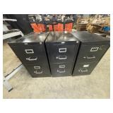 Three black filing cabinets