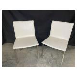 2 white chairs Made for CB2