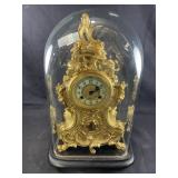 Antique French rococo revival clock with key
