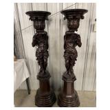 Pair of Greco-roman walnut torchere