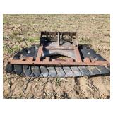 Skid steer manure scraper