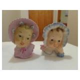 2 Baby head vases 6"