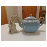 Standing Lady and teapot