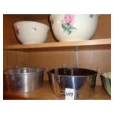 Upper cabinet contents w/cake pans and mixing bowls