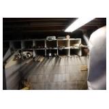 metal and plastic stock in cabinet