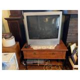 Sanyo Television and DVD/VHS player with stand and DVD's
