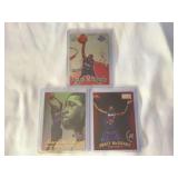 (3) 1997-98 Tracy McGrady Rookie Card Lot: Topps Stadium Club, Fleer Flair Showcase, and SkyBox Premium