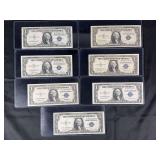 Lot of 7 US One Dollar Silver Certificates Series 1935
