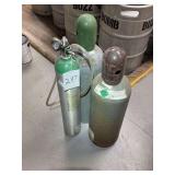 (3) compressed gas tanks