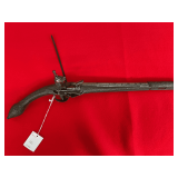 Flintlock Miquelet Pistol with Ornate Metalwork