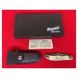 Schrade Scrimshaw SC500 Folding Knife with Buffalo Scene