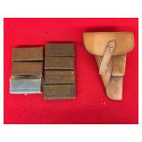 Firearm Accessory Lot: Leather Holster and Seven Boxes of Ammunition