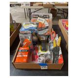 Assorted Hardware and Tool Lot including Halo Floodlight, Ridgid Diamond Blade, and Paslode Nails
