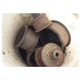 bucket of idler pulleys