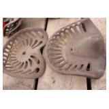 pair of cast iron seats