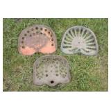 pair of cast iron seats