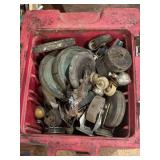 Assorted Industrial Casters and Wheels in Red Plastic Bin