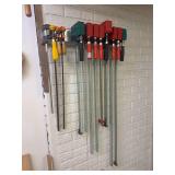 Assorted Woodworking Parallel and Bar Clamps with Wall-Mounted Storage Rack
