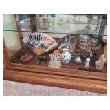 Assorted Decorative Collectibles Including Fans, Pottery, and Small Accessories