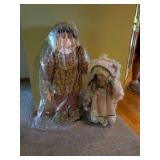 Pair of Decorative Dolls: One Fabric Scarecrow and One Porcelain Girl
