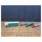 (4) Semi Trucks + Trailers