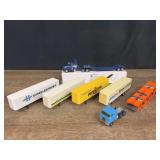 (7) 1/64 Trucks and Trailers