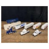 (8) 1/64 Trucks and Trailers