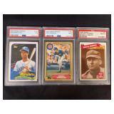 Lot of 3 Graded Baseball Cards - Ken Griffey Jr. 1989 Topps Traded #41T PSA 7, Greg Maddux 1987 Topps Traded #70T PSA 9, and Walter Johnson 1989 Swell Baseball Greats #3 PSA 9