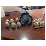 Decorative Lot Featuring Carved Soapstone Owls, Pierced Spheres, and Agate Bookends