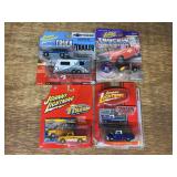 (4) Trucks + Trailer NIB Johnny Lightning