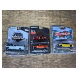 (3) 1/64 Trucks NIB Green Light