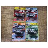(4)  1/64 Pickup Trucks NIB Auto World