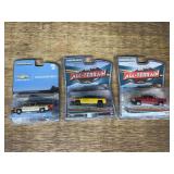 (3) 1/64 Trucks NIB Green Light
