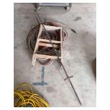 Assorted Lot with Hose, Wooden Step Stool, and Metal Stakes