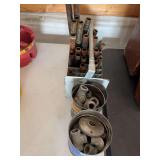 Assorted Metal Pipes, Fittings, and Hardware in Metal Caddy and Tins