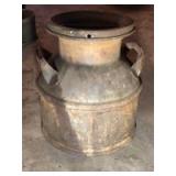 Small milk can. 2-3 gallon