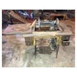 New Home sewing machine & stand. Treadle-type