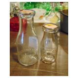 (2) Heischmidt glass dairy bottles