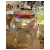 Large glass counter jar w. metal lid