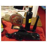 grouping of black bottles, vases, plus