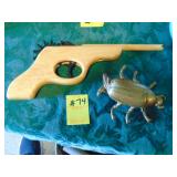 Wooden Rubber band pistol and brass ticket holder
