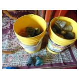 2 buckets of glass insulators