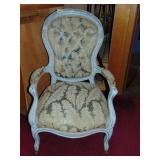 painted, upholstered parlor chair on casters