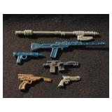 lot of weapons, staffs, blasters
