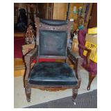 heavily carved East Lake style chair